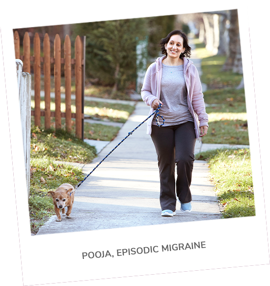 Real Aimovig® patient, Pooja, walking her dog